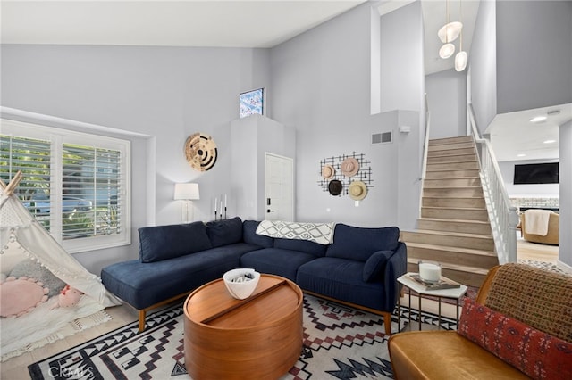 3388 Tonopah St, Oceanside, CA 92054 - living area with high vaulted ceiling and stairway