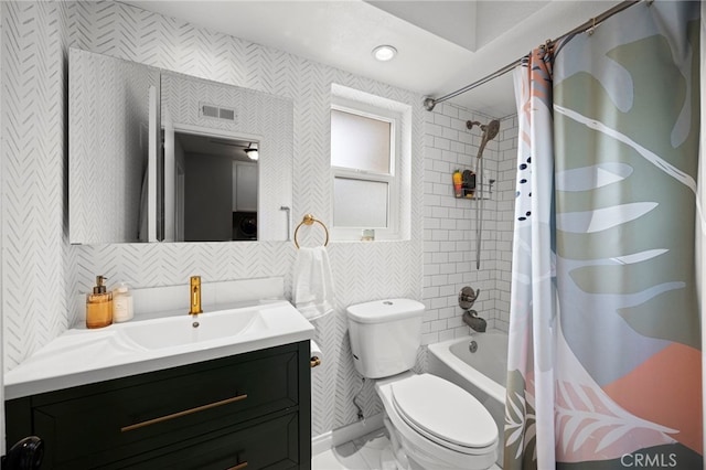 3388 Tonopah St, Oceanside, CA 92054 - bathroom featuring toilet, vanity, shower / bathtub combination with curtain, and tile walls