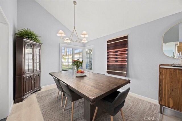 3388 Tonopah St, Oceanside, CA 92054 - dining space with a chandelier, baseboards, and high vaulted ceiling