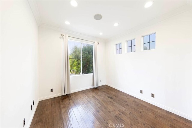 127 Lessay, Newport Coast, CA 92657 - empty room with crown molding, wood finished floors, baseboards, and recessed lighting