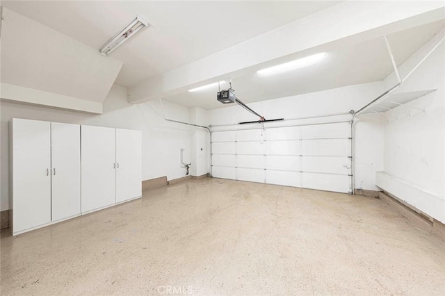 127 Lessay, Newport Coast, CA 92657 - garage featuring a garage door opener