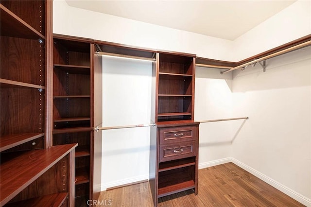 127 Lessay, Newport Coast, CA 92657 - spacious closet featuring wood finished floors