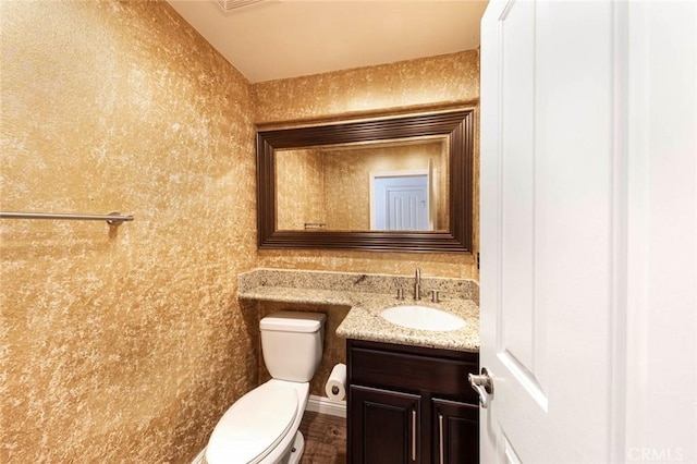 127 Lessay, Newport Coast, CA 92657 - half bath with vanity, toilet, and lofted ceiling