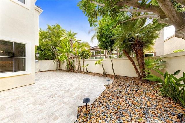 127 Lessay, Newport Coast, CA 92657 - fenced backyard featuring a patio