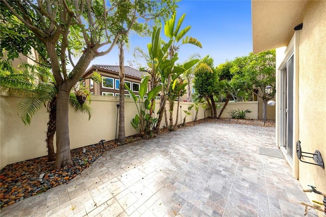 127 Lessay, Newport Coast, CA 92657 - fenced backyard featuring a patio area