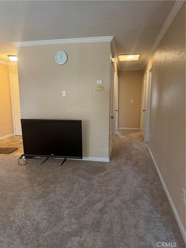 455 Cherry Ln Unit K, Manteca, CA 95337 - hallway with crown molding, carpet floors, and baseboards