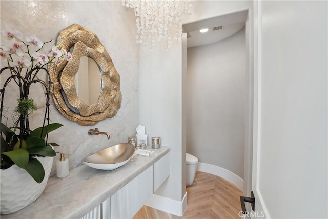 4177 Prado De Los Pajaros, Calabasas, CA 91302 - bathroom featuring a sink, toilet, and baseboards