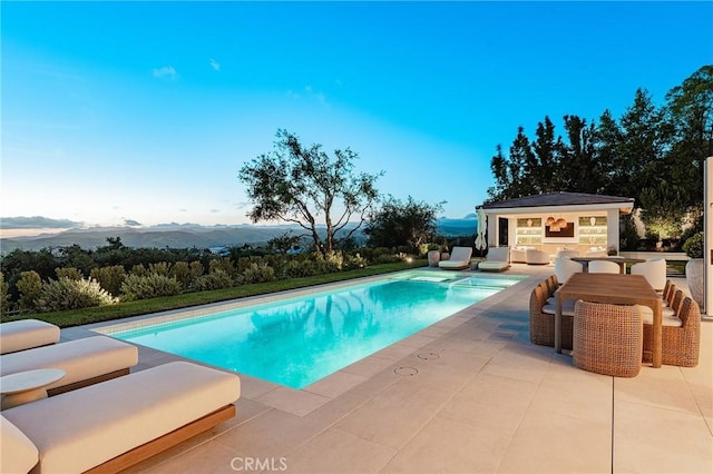 4177 Prado De Los Pajaros, Calabasas, CA 91302 - swimming pool featuring a patio, a storage structure, an outbuilding, and a mountain view
