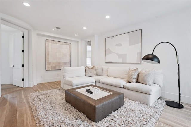 4177 Prado De Los Pajaros, Calabasas, CA 91302 - living room with baseboards, light wood-style floors, and recessed lighting