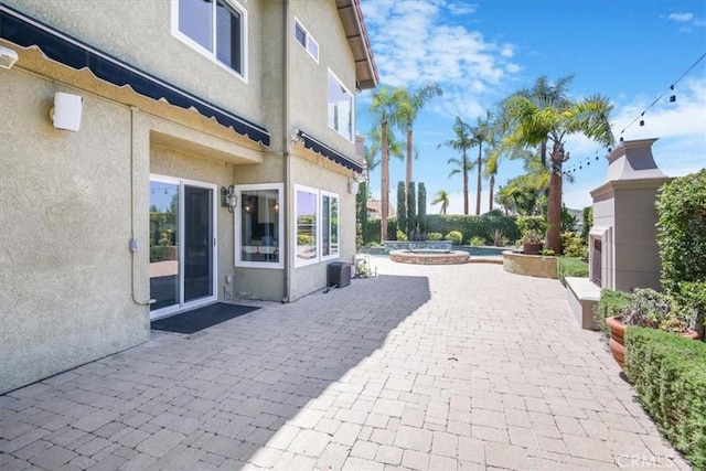 16 Vistamar Dr, Laguna Niguel, CA 92677 - view of patio / terrace featuring a pool with connected hot tub