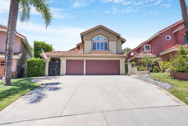 16 Vistamar Dr, Laguna Niguel, CA 92677 - mediterranean / spanish-style house featuring stucco siding, a tile roof, concrete driveway, and a front lawn