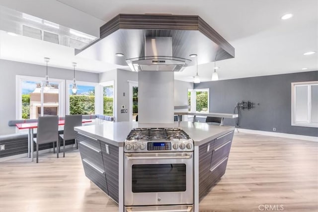 16 Vistamar Dr, Laguna Niguel, CA 92677 - kitchen featuring gas range, light wood-style flooring, modern cabinets, island exhaust hood, and recessed lighting