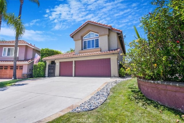 16 Vistamar Dr, Laguna Niguel, CA 92677 - mediterranean / spanish house with stucco siding, concrete driveway, a tiled roof, and an attached garage