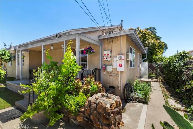 2271 Kellogg Park Dr, Pomona, CA 91768 - view of front of house featuring stucco siding and covered porch