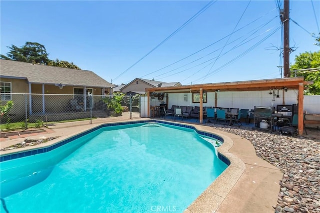 2271 Kellogg Park Dr, Pomona, CA 91768 - view of swimming pool with a fenced backyard, outdoor lounge area, and a patio