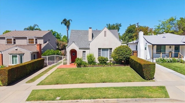1511 Coolidge Ave, Pasadena, CA 91104 - view of front of property with a gate, stucco siding, and a chimney