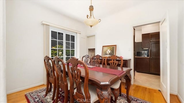 1511 Coolidge Ave, Pasadena, CA 91104 - dining space featuring light wood-style floors and baseboards