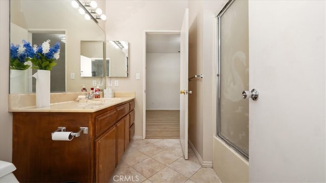 1511 Coolidge Ave, Pasadena, CA 91104 - bathroom with vanity, tile patterned flooring, enclosed tub / shower combo, and baseboards