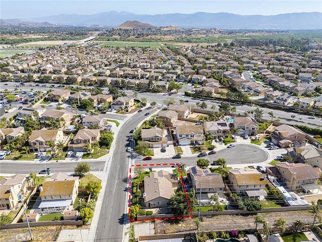 12750 Jack Ln, Eastvale, CA 92880 - aerial perspective of suburban area with mountains and property boundaries highlighted
