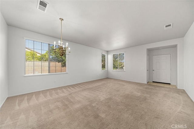 12750 Jack Ln, Eastvale, CA 92880 - empty room with a chandelier, light colored carpet, and baseboards