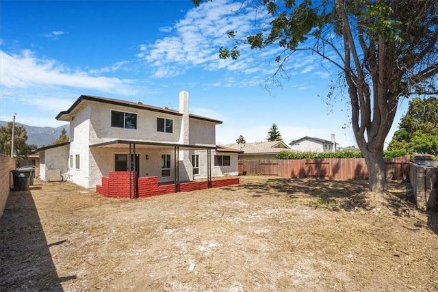 1840 E Hawthorne St, Ontario, CA 91764 - back of property featuring a fenced backyard and stucco siding