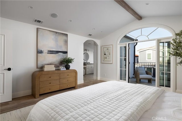 110 Via Orvieto, Newport Beach, CA 92663 - bedroom with access to exterior, arched walkways, wood finished floors, baseboards, and connected bathroom