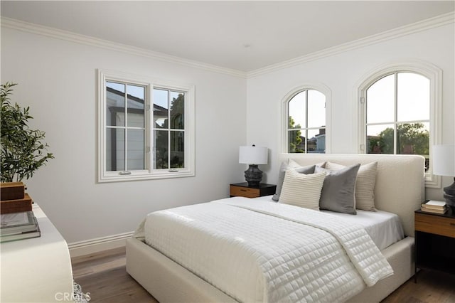 110 Via Orvieto, Newport Beach, CA 92663 - bedroom featuring wood finished floors, crown molding, and baseboards