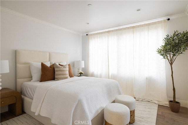 110 Via Orvieto, Newport Beach, CA 92663 - bedroom featuring wood finished floors, crown molding, and baseboards