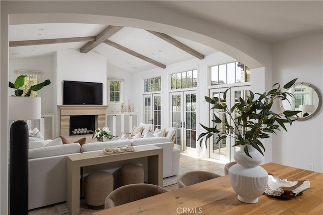 110 Via Orvieto, Newport Beach, CA 92663 - living room featuring arched walkways, french doors, and a fireplace