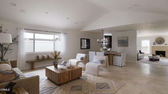 1325 Rexford Ave, Pasadena, CA 91107 - living area with lofted ceiling, a fireplace with raised hearth, and baseboards
