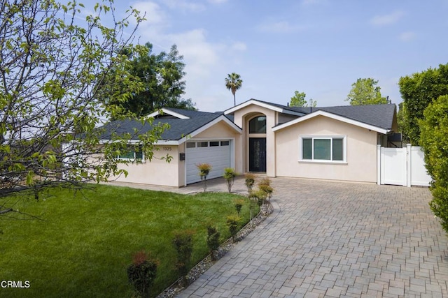 1325 Rexford Ave, Pasadena, CA 91107 - single story home featuring stucco siding, driveway, a garage, and roof with shingles
