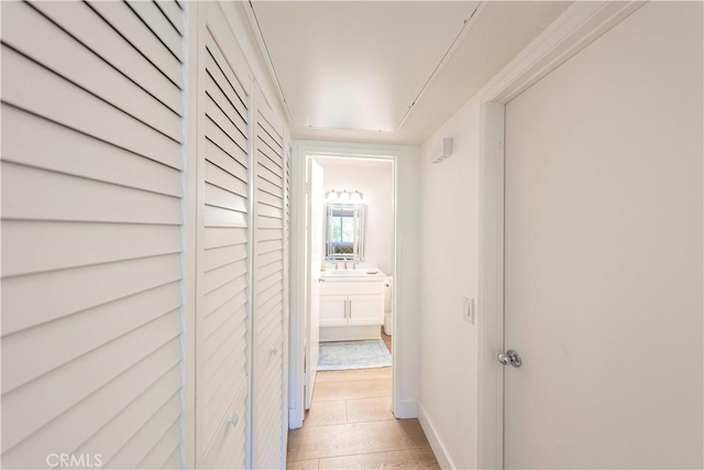28107 Caldaro, Laguna Niguel, CA 92677 - hallway featuring baseboards and a sink
