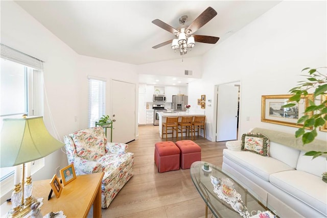 28107 Caldaro, Laguna Niguel, CA 92677 - living room featuring light wood-style floors, a ceiling fan, and lofted ceiling