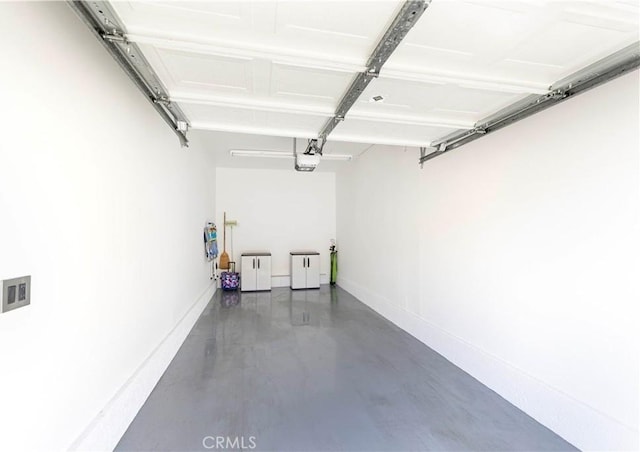 28107 Caldaro, Laguna Niguel, CA 92677 - garage with a garage door opener and baseboards