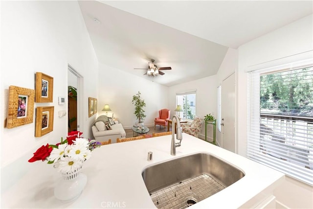 28107 Caldaro, Laguna Niguel, CA 92677 - kitchen featuring a sink, light countertops, vaulted ceiling, a ceiling fan, and open floor plan