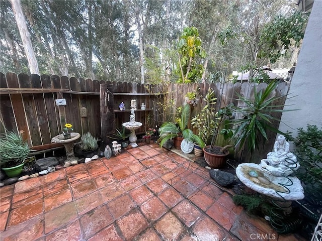 24603 Copper Cliff Ct Unit 11, Lake Forest, CA 92630 - view of patio with a fenced backyard