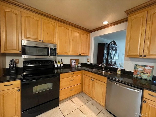 24603 Copper Cliff Ct Unit 11, Lake Forest, CA 92630 - kitchen with appliances with stainless steel finishes, a sink, light tile patterned floors, dark stone countertops, and crown molding
