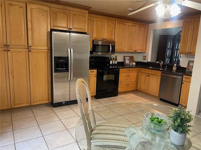24603 Copper Cliff Ct Unit 11, Lake Forest, CA 92630 - kitchen with stainless steel appliances, a sink, light tile patterned floors, and a ceiling fan