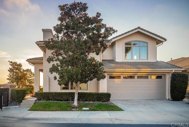 1808 Amalfi Dr, Encinitas, CA 92024 - view of front of house with a garage, concrete driveway, and stucco siding