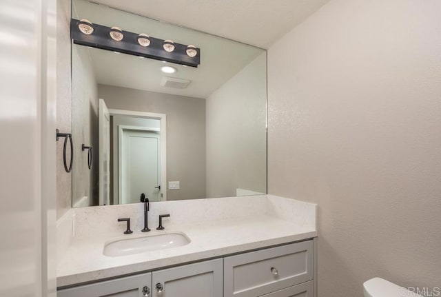 1808 Amalfi Dr, Encinitas, CA 92024 - half bathroom featuring vanity and toilet
