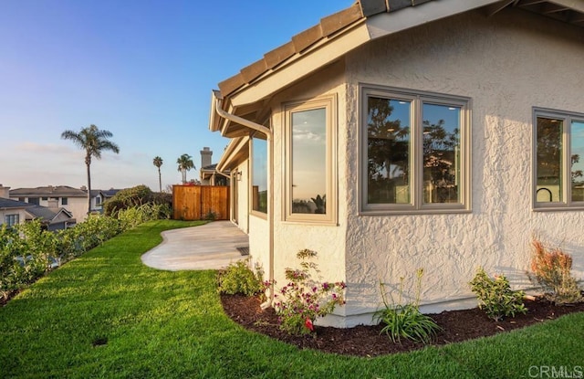 1808 Amalfi Dr, Encinitas, CA 92024 - view of side of home with stucco siding and a patio area