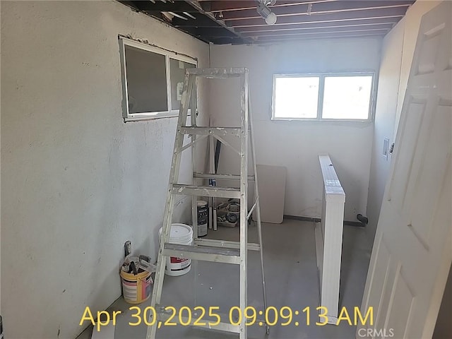 miscellaneous room with concrete flooring