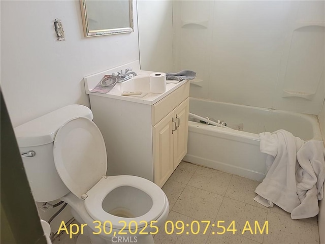 bathroom with toilet, vanity, and bathing tub / shower combination