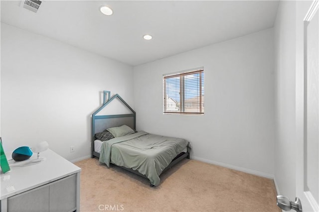 bedroom with light carpet, baseboards, and recessed lighting