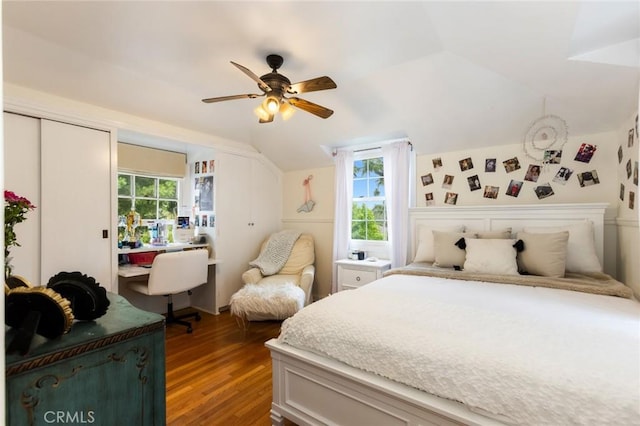 4225 Myrtle Ave, Long Beach, CA 90807 - bedroom with lofted ceiling, a desk, wood finished floors, multiple closets, and a ceiling fan