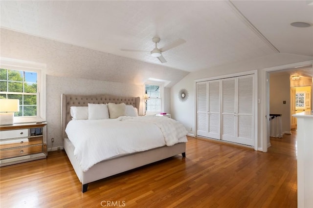 4225 Myrtle Ave, Long Beach, CA 90807 - bedroom featuring lofted ceiling, light wood finished floors, a closet, a ceiling fan, and baseboards