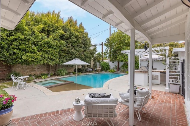 4225 Myrtle Ave, Long Beach, CA 90807 - view of pool with a fenced backyard, a patio area, exterior kitchen, and a pool with connected hot tub