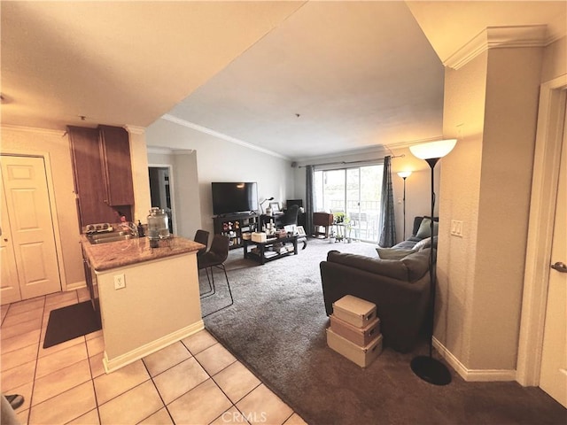 1980 Las Colinas Cir Unit 301, Corona, CA 92879 - living room featuring crown molding, light carpet, light tile patterned flooring, baseboards, and vaulted ceiling