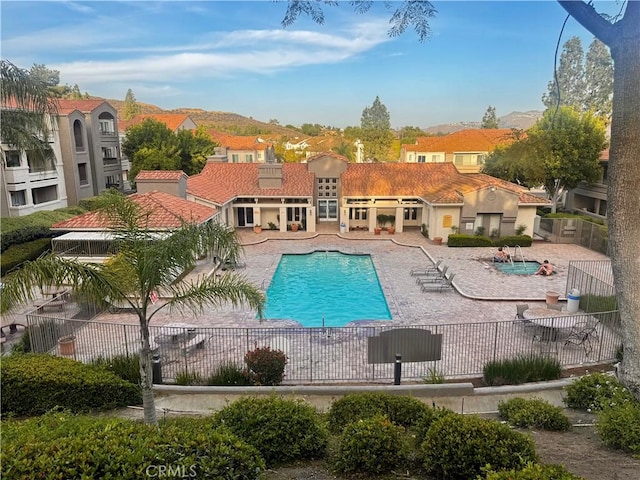 1980 Las Colinas Cir Unit 301, Corona, CA 92879 - community pool with a patio, a mountain view, and a residential view