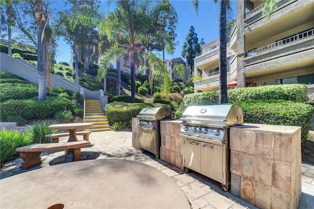 1980 Las Colinas Cir Unit 301, Corona, CA 92879 - view of patio featuring stairs and area for grilling